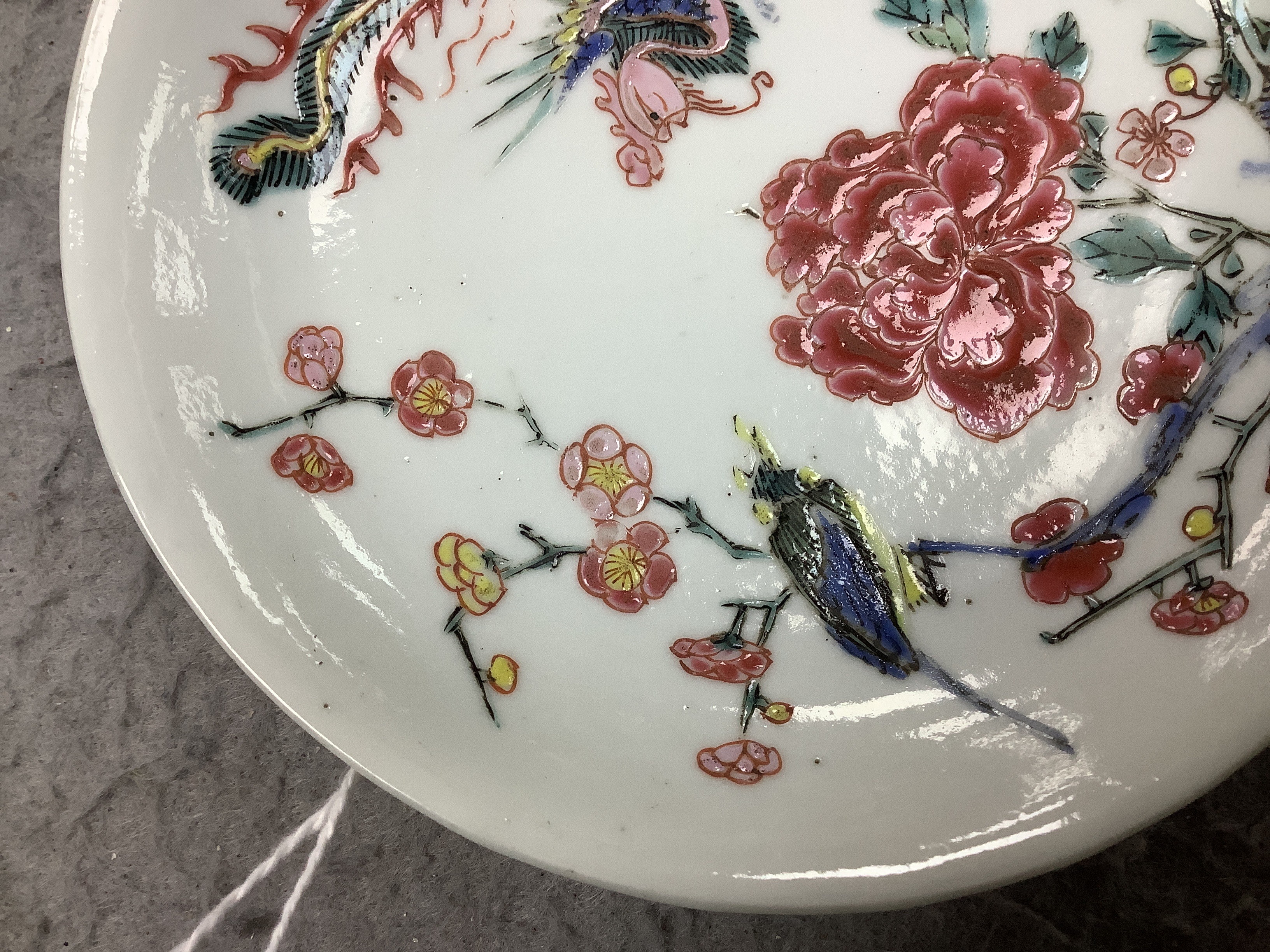 A Chinese famille rose fencai ‘phoenix and peony’ saucer dish, Yongzheng period, 10cm